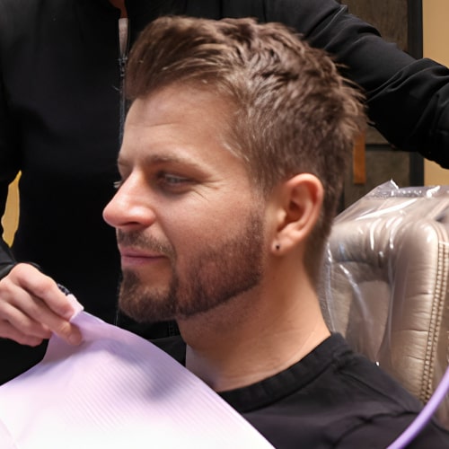 Issaquah dentist with a smiling man in a dental chair
