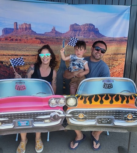 Amanda is smiling with her family